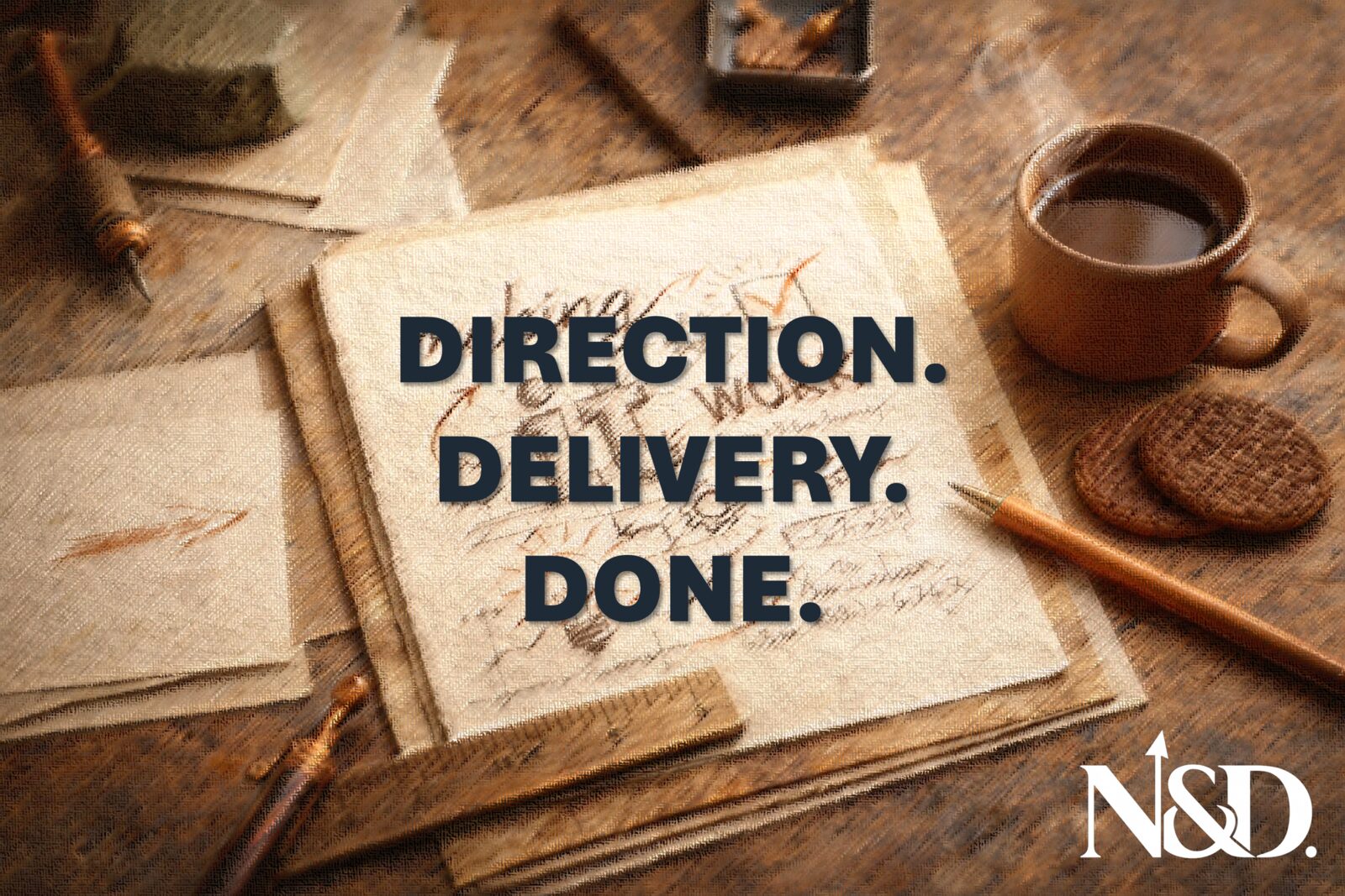 A notebook reading Direction. Delivery. Done. on a desk with tea and biscuits
